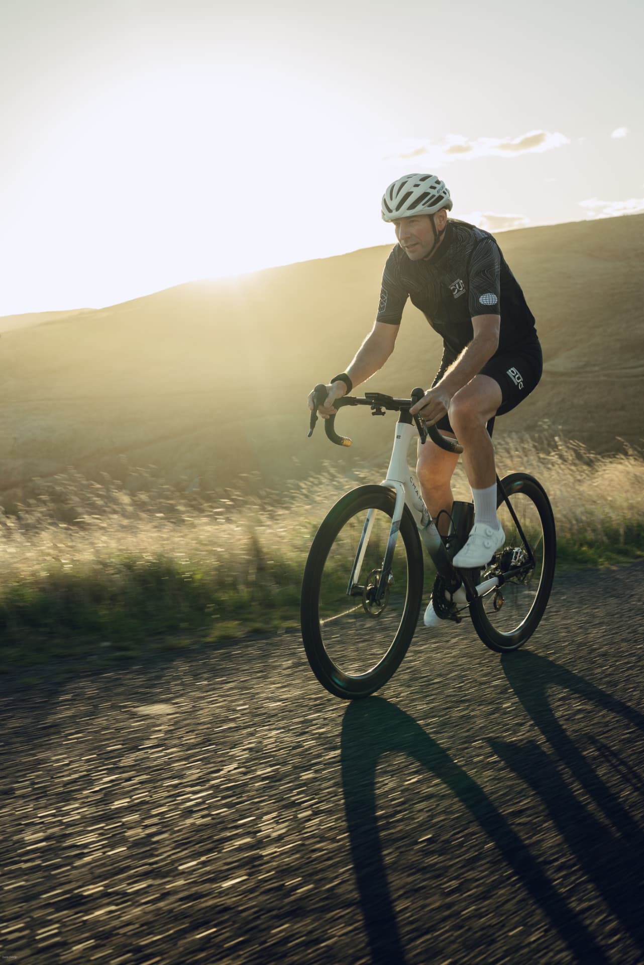 Rider on a white bike fitted with Duo wheels